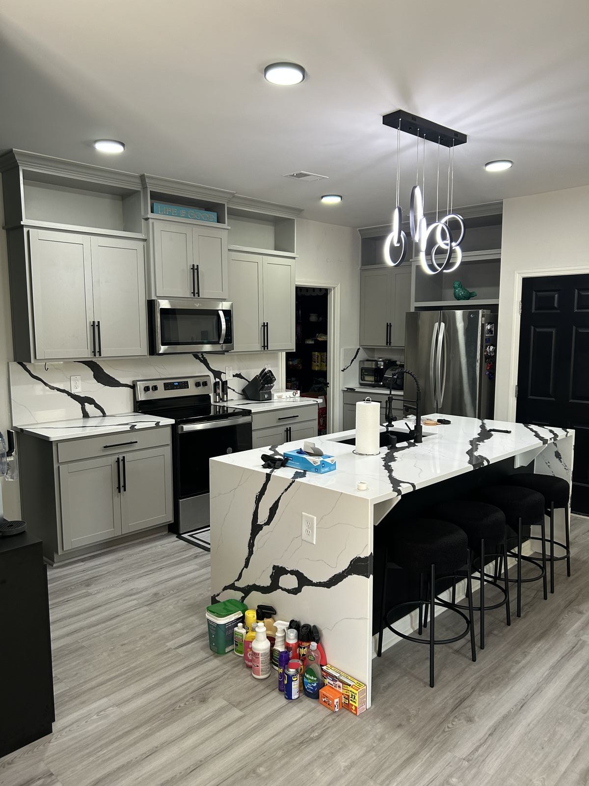 Calacatta Black Ice quartz countertops installed in a Gainesville, GA kitchen