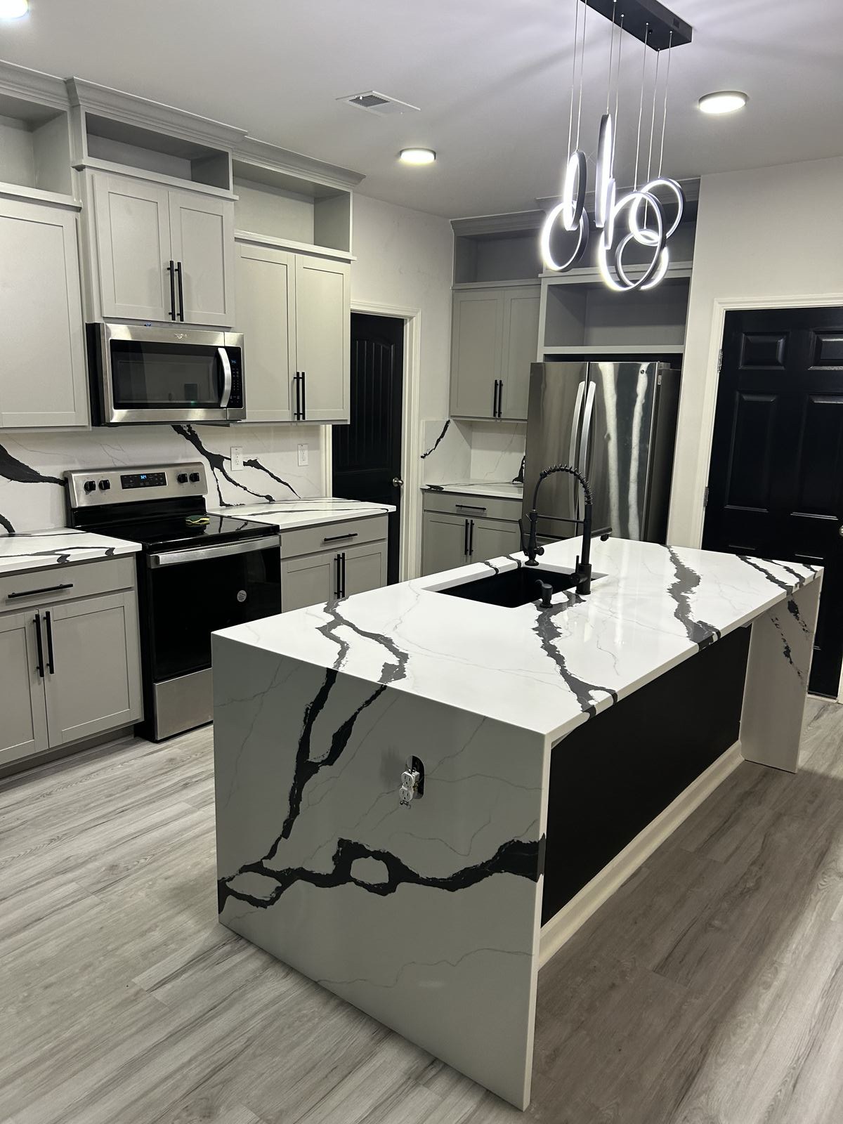 Calacatta quartz countertop installed for a kitchen remodel in Gainesville, GA