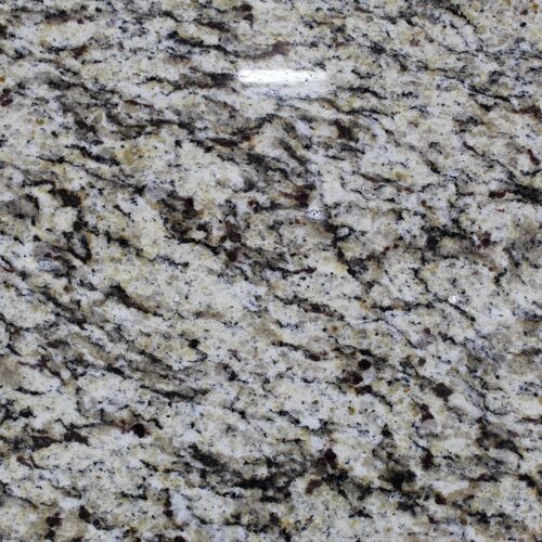Santa Cecilia granite slab close-up, cream stone with black and burgundy speckling