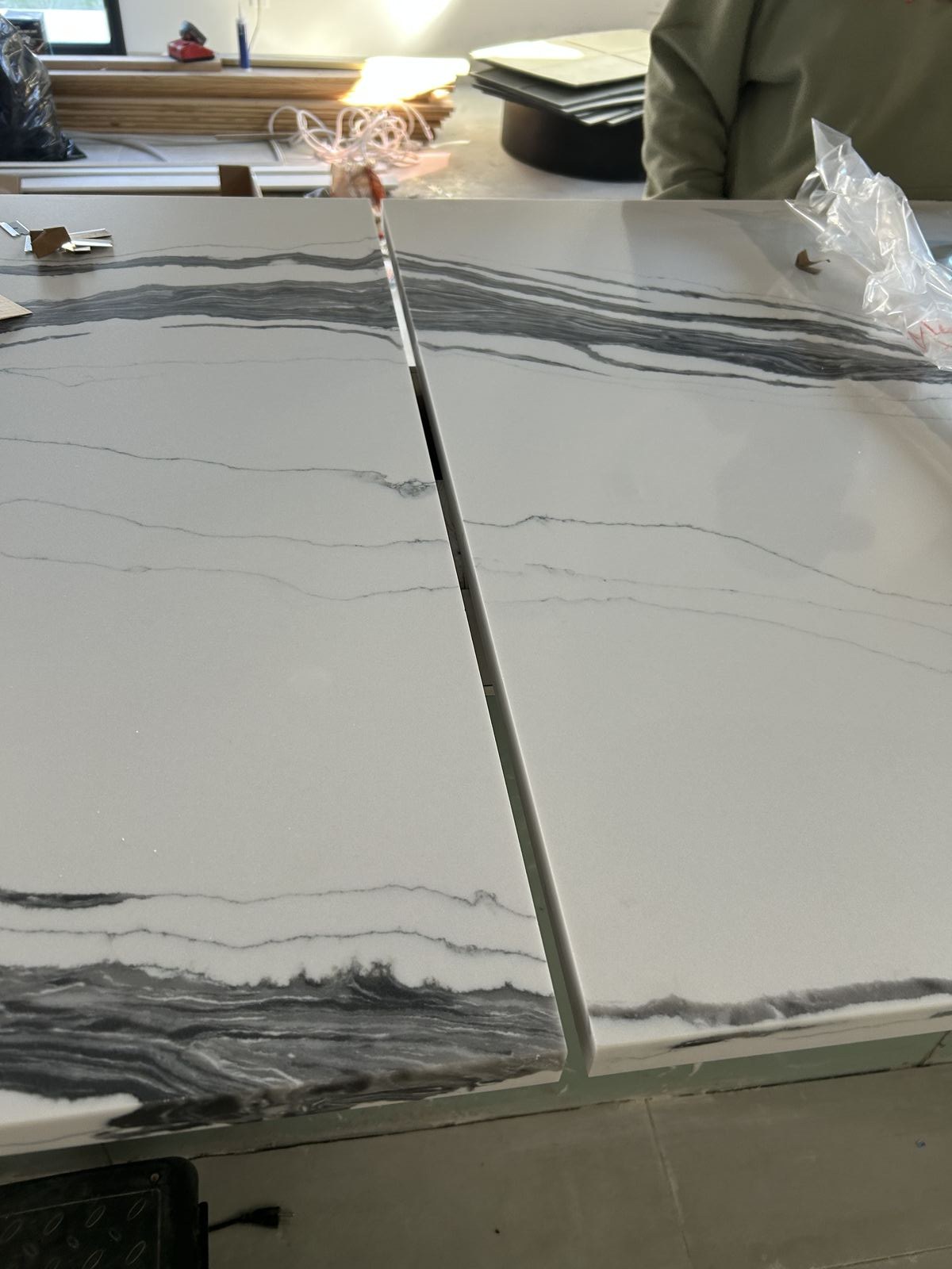 Bookmatched natural stone slabs seamed together in the Southeastern Granite Co fabrication shop