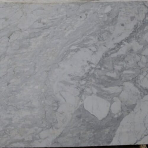 Calacatta marble slab close-up, white stone with dramatic grey veining