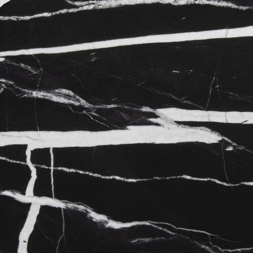 Nero Marquina porcelain slab close-up, black surface with bold white veining