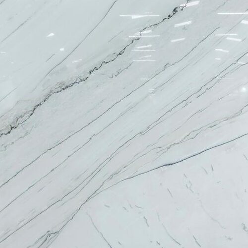 Casablanca quartzite slab close-up, white stone with diagonal grey veining