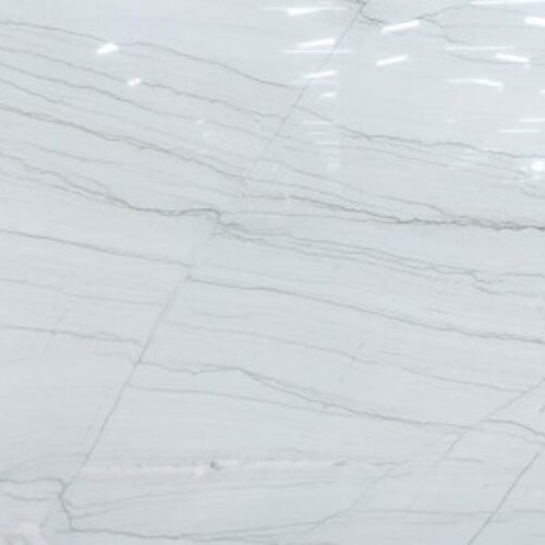 Santorini White Crystal quartzite slab close-up, bright white stone with fine grey veining