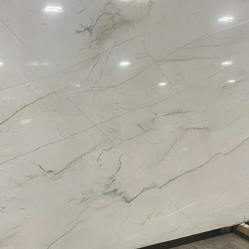 Vento Cinza quartzite slab close-up, white stone with fine grey veining